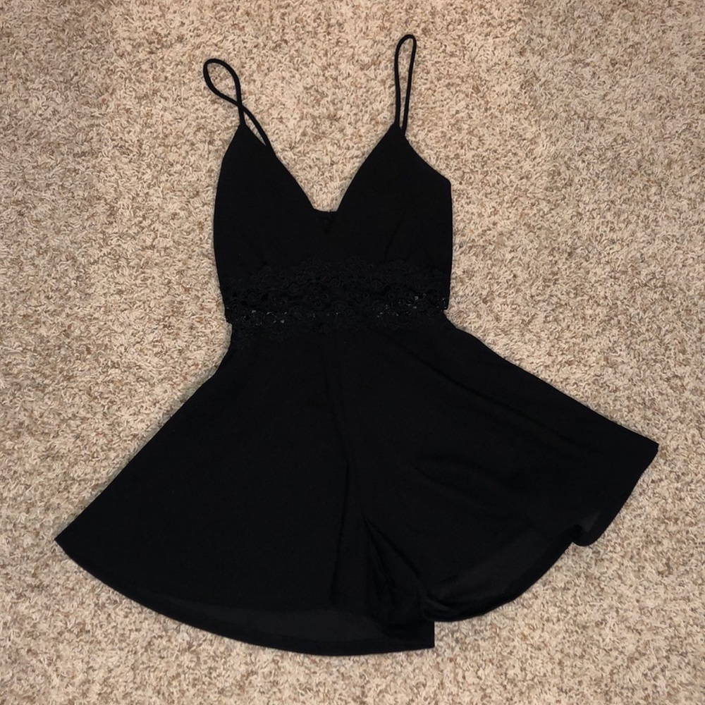 Black dress with lace detailing (Skort style)